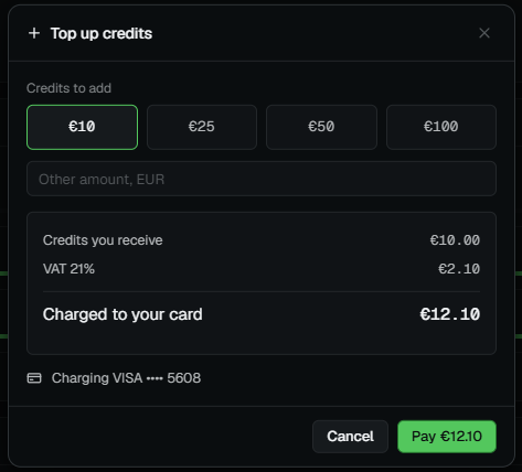 The Top up credits dialog with presets and the VAT breakdown